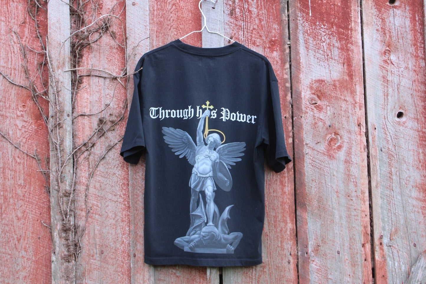 Through His Power T-shirt in Black